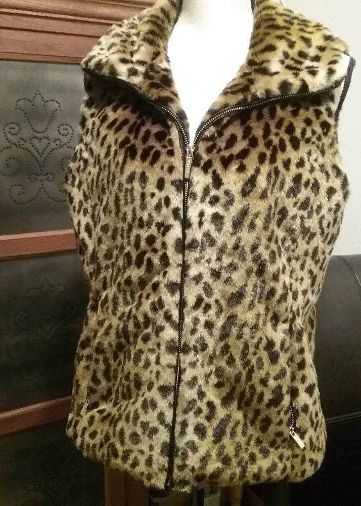 Calvin Klein Leopard Print Fleece Vest.